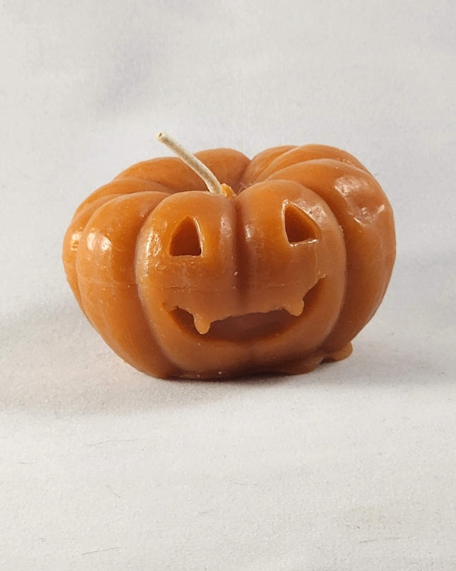 Orange Jack-o-lantern votive