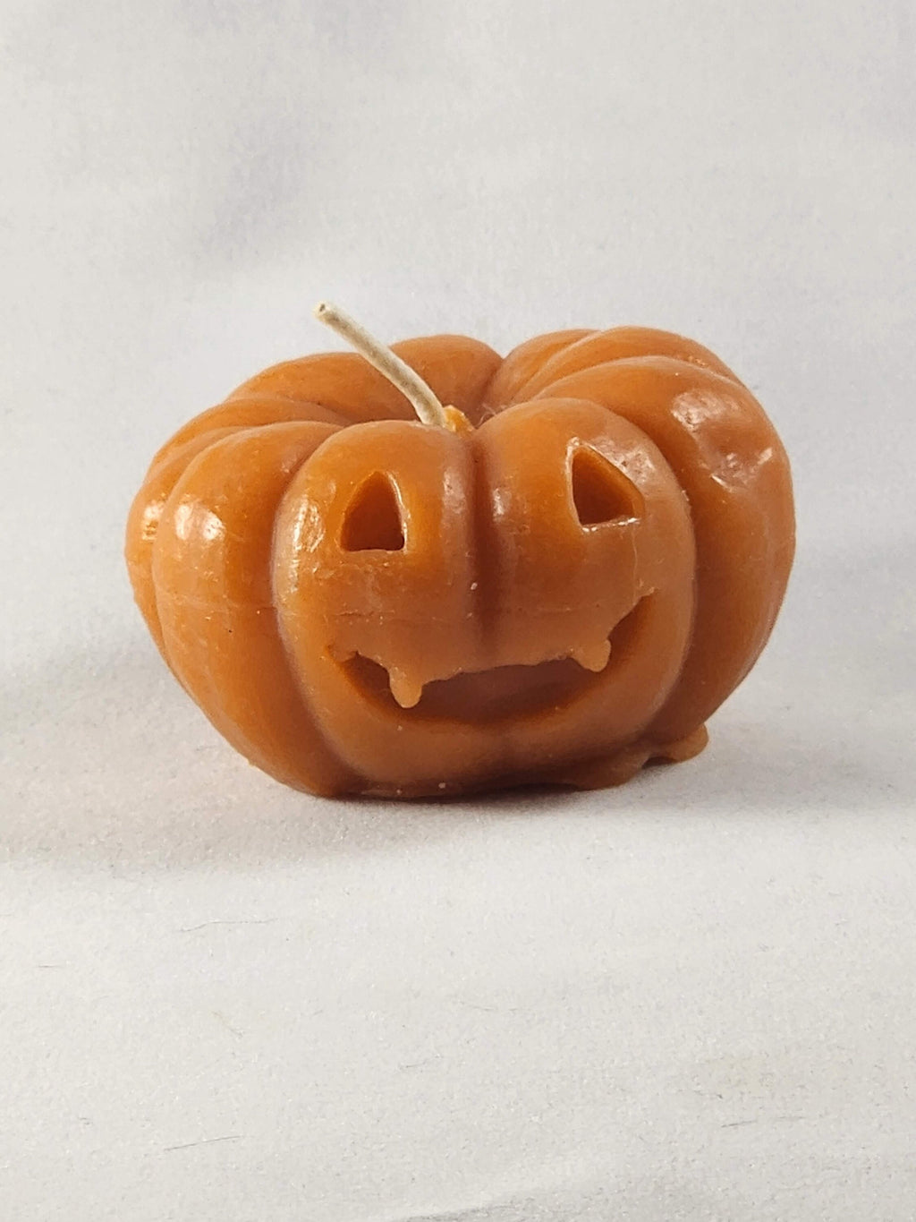 Orange Jack-o-lantern votive