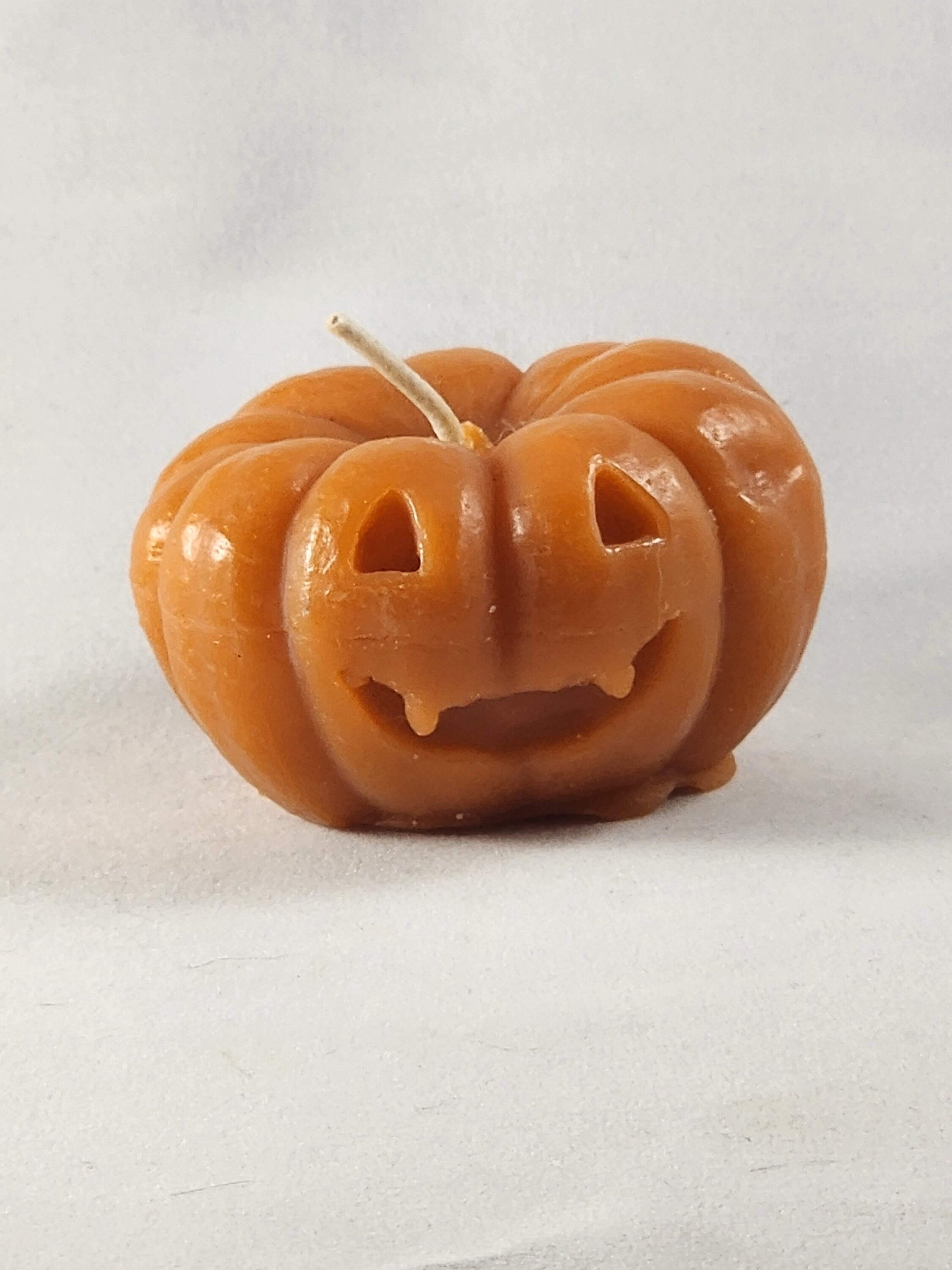 Orange Jack-o-lantern votive