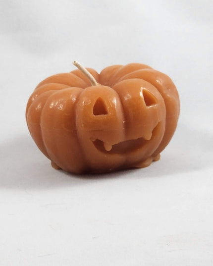 Orange Jack-o-lantern votive