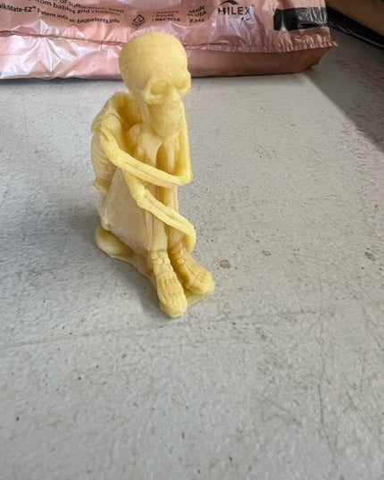 Creepy Skeleton Candle - Gold