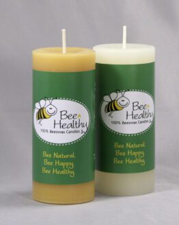 A Set Of Two Twisted Octagonal Pillar Candles