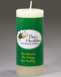 A medium white pillar candle