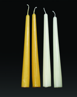 A gold taper candle eight inches