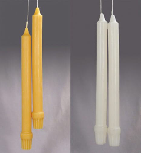 two pairs of Colonial-style taper beeswax candles