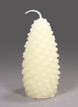 A large white pinecone shaped candle