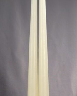 A white taper candle 10 inches