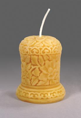 intricately sculpted candle