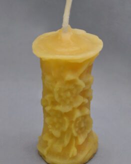 A smaller image of a small gold flower pillar candle