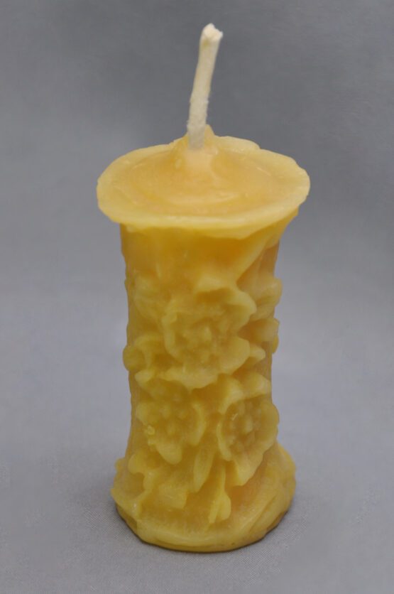 A smaller image of a small gold flower pillar candle